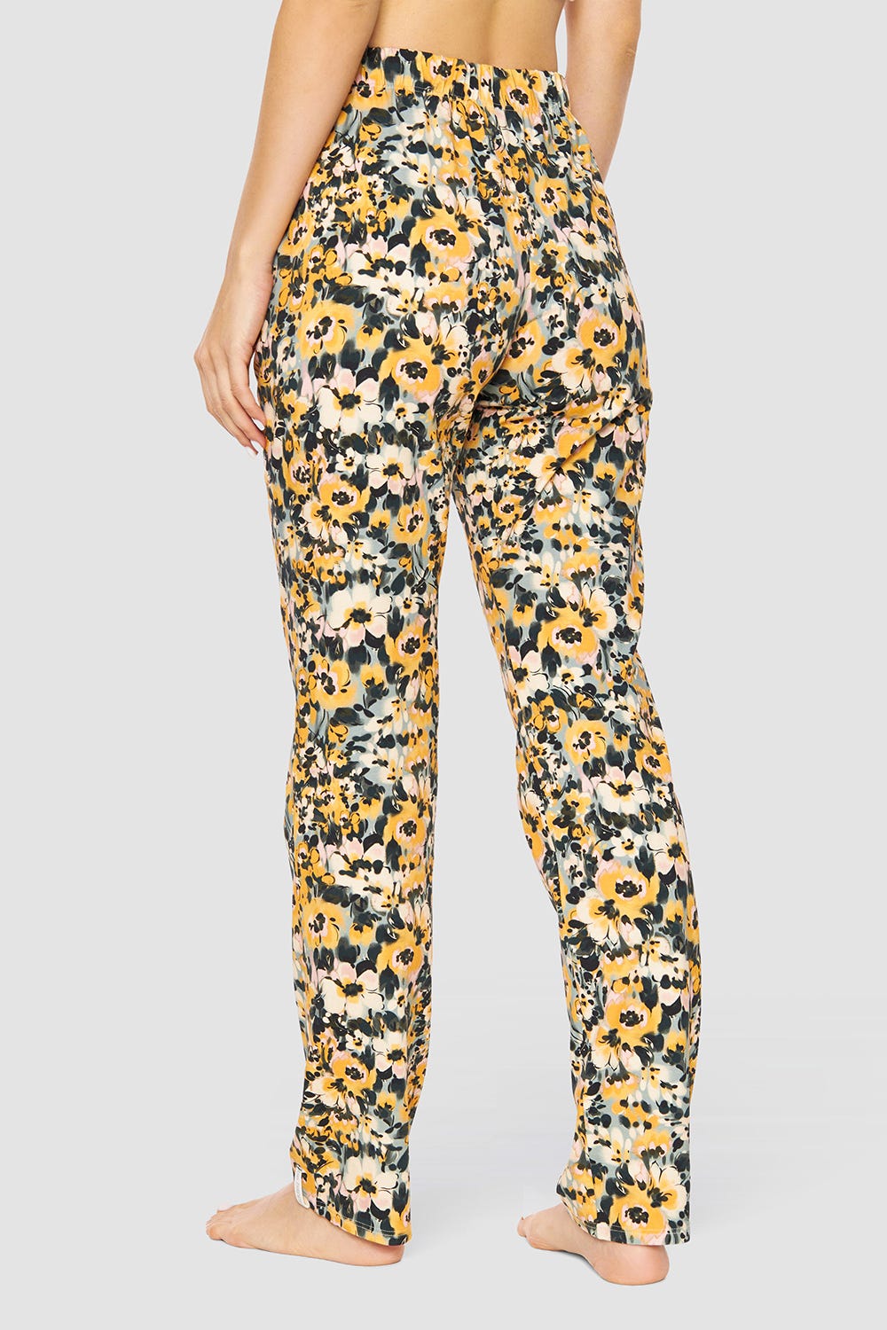 Rückansicht von Hose im gelben Blumenmuster Baumwolle/Elasthan