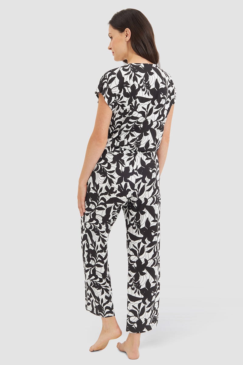 Rückansicht von Jumpsuit im Blätter-Druck Schwarz-Weiß Viskose/Elasthan