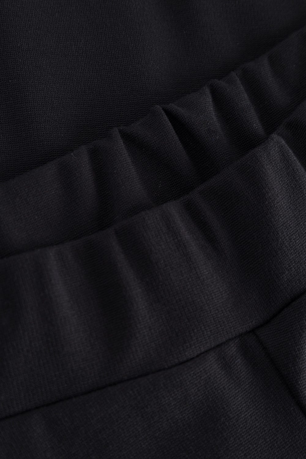 Detailbild 2 von Basic Leggings in Schwarz Logodetail Materialmix